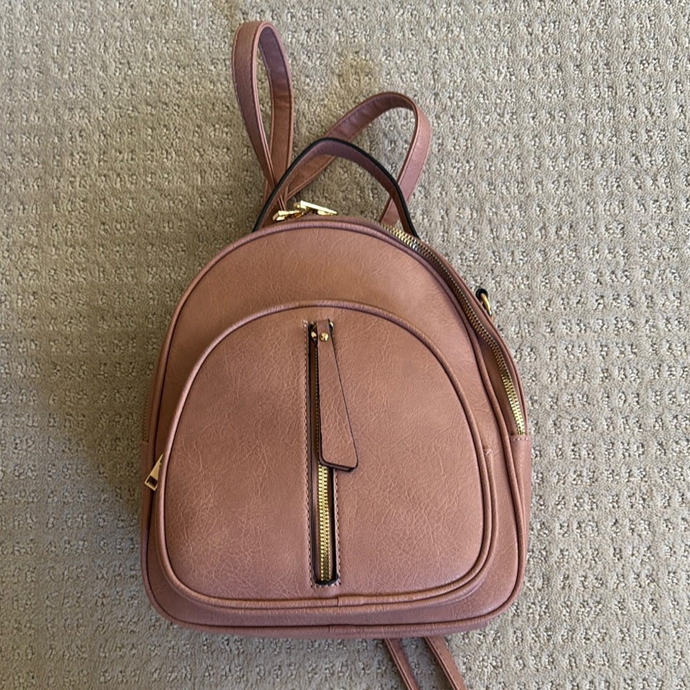 Elegant Pink Leather Look Backpack